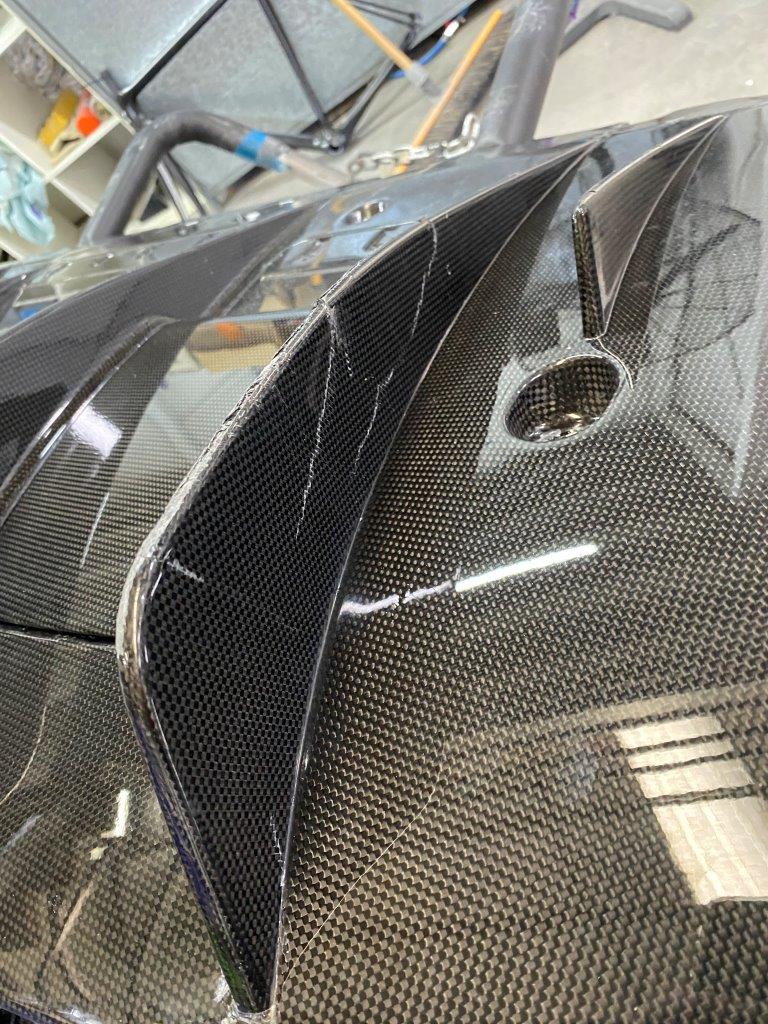 Why do people like carbon Fiber parts on cars?